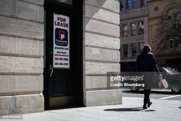 Lease sign at a building in Washington, DC, US, on Tuesday, March 7, 2023. The capital city's main business district remains strangely desolate and...