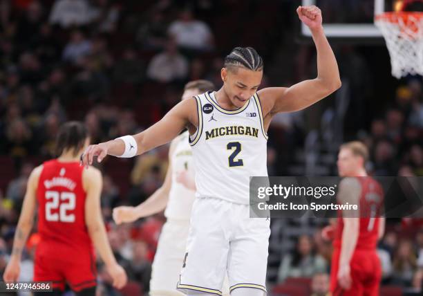 Michigan Wolverines guard Kobe Bufkin reacts to a play during the first half of the second round of the Big Ten Conference Men's Basketball...