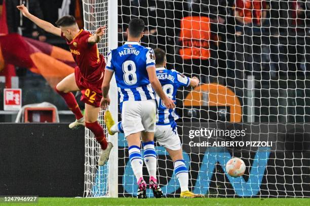 Roma's Italian forward Stephan El Shaarawy scores the opening goal during the UEFA Europa League round of 16 first leg football match between AS Rome...