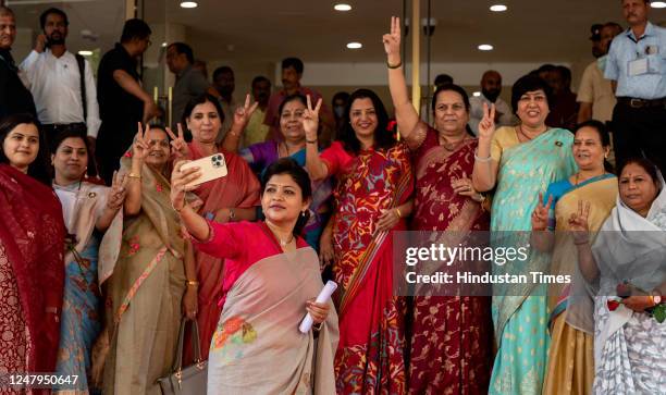 Women legislators of all political parties pose together for a selfie on the occasion of International Women's Day during the Maharashtra Budget...