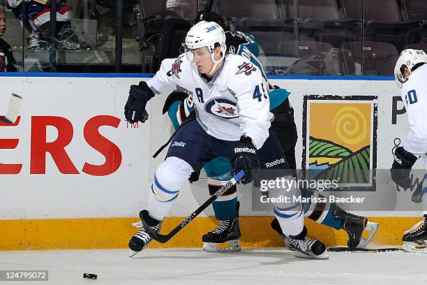 Mark Scheifele of the Winnipeg Jets chases the puck alongside the side boards against the San Jose Sharks during day two of the 2011 Vancouver...