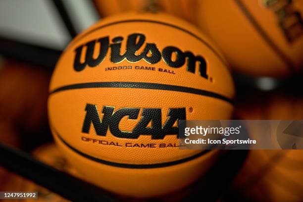 Detail view of a Wilson basketball is seen on a rack in action during a Big Ten Tournament game between the Michigan Wolverines and the Rutgers...