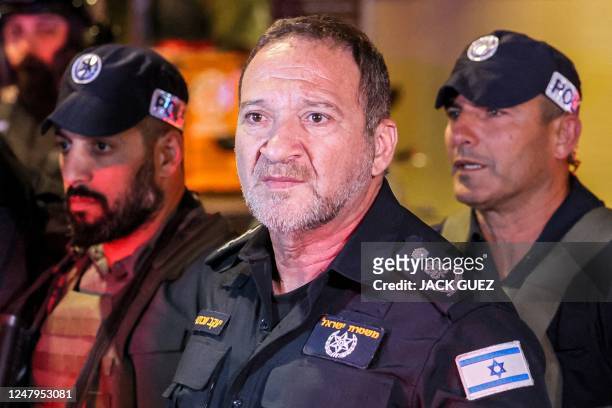 Israel's Police Commissioner Kobi Shabtai arrives at the scene of a shooting attack along Dizengoff Avenue in the centre of Tel Aviv on March 9,...