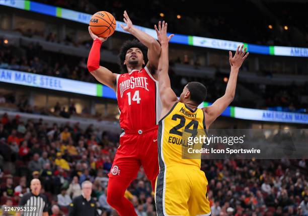 Iowa Hawkeyes forward Kris Murray contends Ohio State Buckeyes forward Justice Sueing shot during the first half of the second round of the Big Ten...