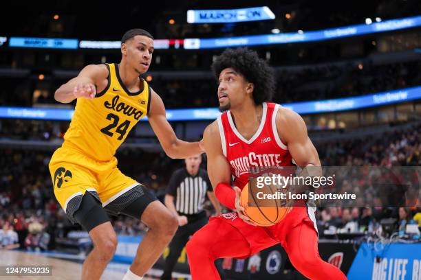 Iowa Hawkeyes forward Kris Murray and Ohio State Buckeyes forward Justice Sueing in action during the first half of the second round of the Big Ten...