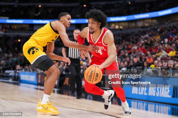 Iowa Hawkeyes forward Kris Murray guards Ohio State Buckeyes forward Justice Sueing during the first half of the second round of the Big Ten...