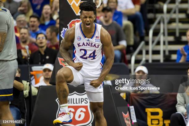 Kansas forward K.J. Adams Jr. Celebrates an and 1 dunk during the Big12 Tournament game between the Kansas Jayhawks and the West Virginia...