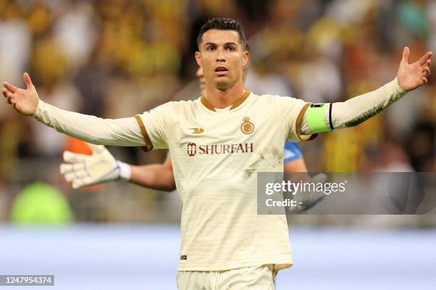 Nassr's Portuguese forward Cristiano Ronaldo reacts during the Saudi Pro League football match between al-Ittihad and al-Nassr at King Abdullah Sport...