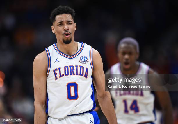 Florida Gators guard Myreon Jones reacts to a three point shot during an SEC Mens Basketball Tournament game between the Mississippi State Bulldogs...