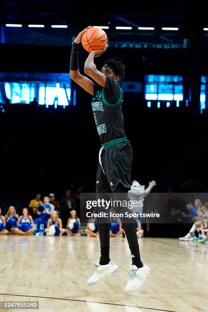 George Mason Patriots Guard Davonte Gaines shoots a three point jump shot during the second half of the Atlantic 10 Mens Basketball Tournament...