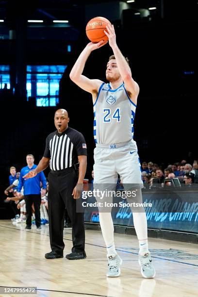 Saint Louis Billikens Guard Gibson Jimerson shoots a three point jump shot during the first half of the Atlantic 10 Mens Basketball Tournament...