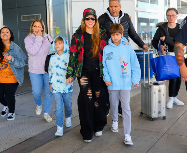 Sasha Pique Mebarak, Shakira and Milan Pique Mebarak are seen at JFK Airport on March 9, 2023 in New York City.