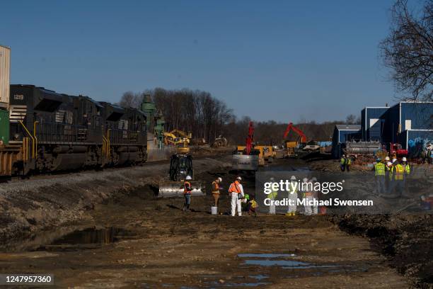 Ohio EPA and EPA contractors collect soil and air samples from the derailment site on March 9, 2023 in East Palestine, Ohio. Cleanup efforts continue...