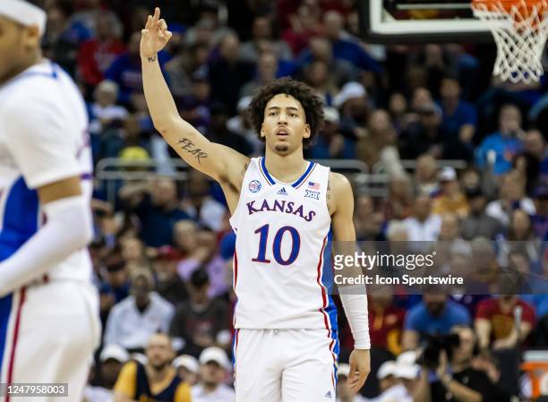 Kansas forward Jalen Wilson gestures a three after his successful shot during the Big12 Tournament game between the Kansas Jayhawks and the West...