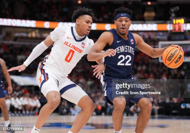 Illinois Fighting Illini guard Terrence Shannon Jr. Guards Penn State Nittany Lions guard Jalen Pickett during the first half of the second round of...