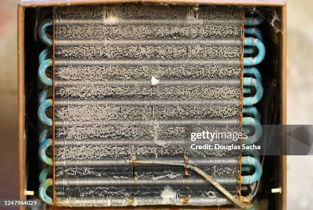 piping coils and vent on a cooling appliance - coiling stock pictures, royalty-free photos & images