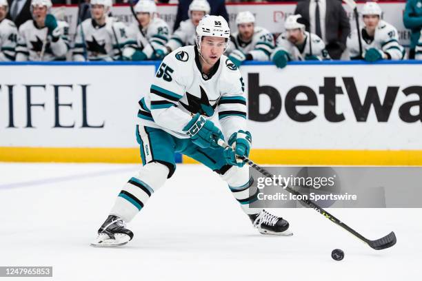 San Jose Sharks' Derrick Pouliot skates with the puck during the first period of an NHL hockey game between the St. Louis Blues and the San Jose...