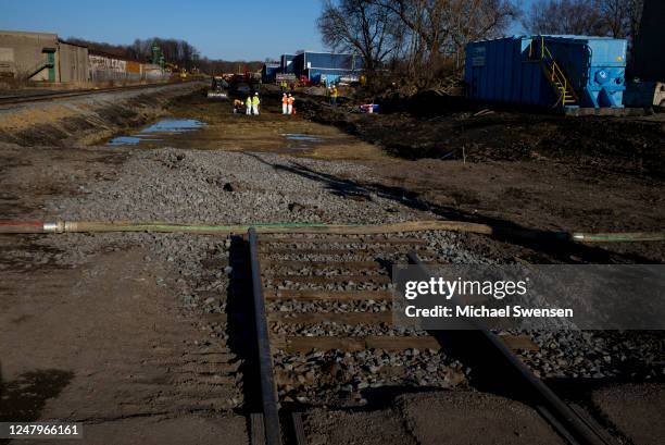 Ohio EPA and EPA contractors collect soil and air samples from the derailment site on March 9, 2023 in East Palestine, Ohio. Cleanup efforts continue...