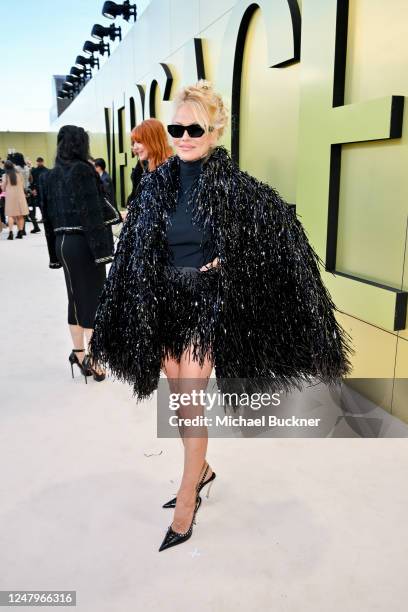 Pamela Anderson at the Versace Fall-Winter 2023 Fashion Show held at Pacific Design Center on March 9, 2023 in West Hollywood, California.