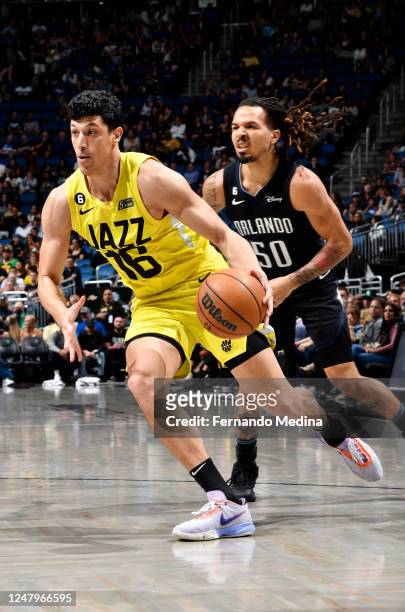Simone Fontecchio of the Utah Jazz drives to the basket during the game against the Orlando Magic on March 9, 2023 at Amway Center in Orlando,...