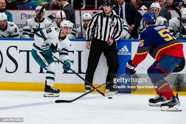 San Jose Sharks' William Eklund, left, gains the blue line while under pressure from St. Louis Blues' Colton Parayko during the second period of an...