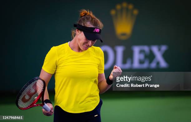 Madison Brengle of the United States in action against Laura Siegemund of Germany during her first-round match on Day 4 of the 2023 BNP Paribas Open...