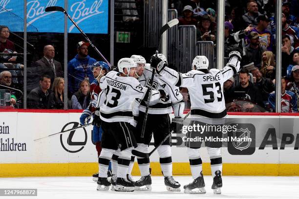 Viktor Arvidsson, Sean Walker, Phillip Danault and Jordan Spence of the Los Angeles Kings celebrate a goal against the Colorado Avalanche at Ball...