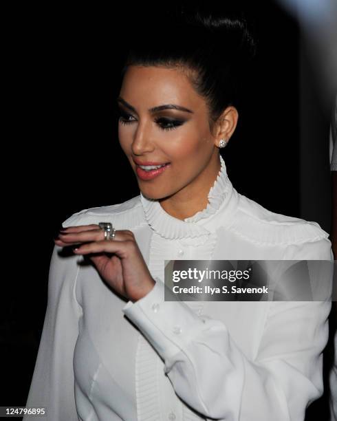 Kim Kardashian attends the Abbey Dawn by Avril Lavigne Spring 2012 fashion show during Style360 at the Metropolitan Pavilion on September 12, 2011 in...