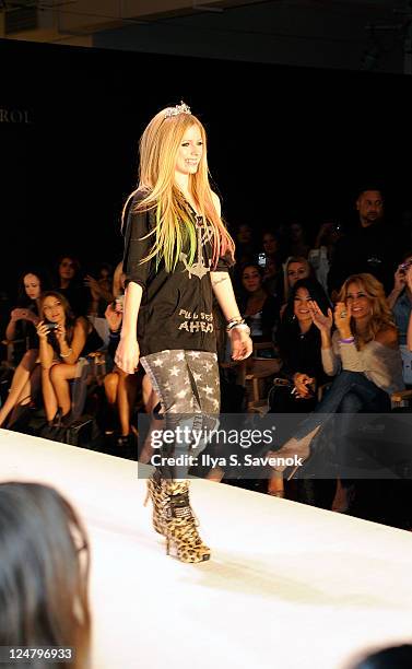 Avril Lavigne walks the runway at the Abbey Dawn by Avril Lavigne Spring 2012 fashion show during Style360 at the Metropolitan Pavilion on September...