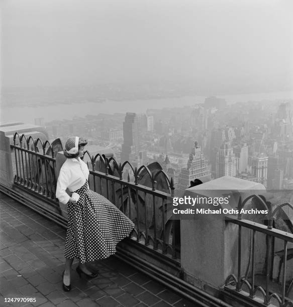 Fashion shoot for the clothing brand Fruit Of The Loom on top of 30 Rockefeller Plaza in New York City, 27th March 1952.