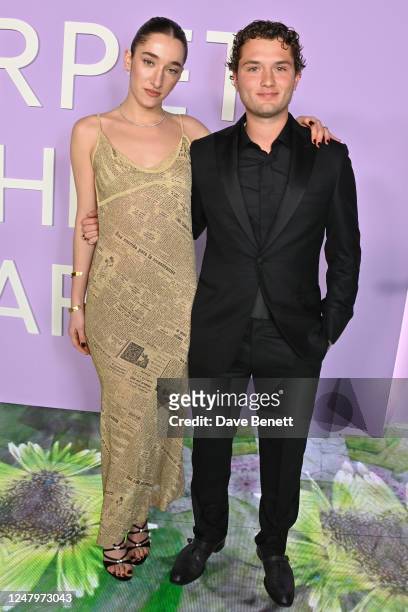 Bella Tilbury and Rafferty Law attend the Green Carpet Fashion Awards 2023 at NeueHouse Hollywood on March 9, 2023 in Hollywood, California.