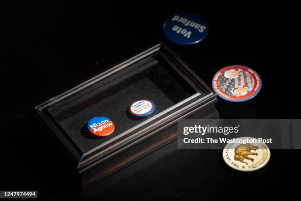 January 16: Political buttons grace the coffee table of Carlton Huffman at his home in Raleigh, N.C., Monday, January 16, 2023. A North Carolina...