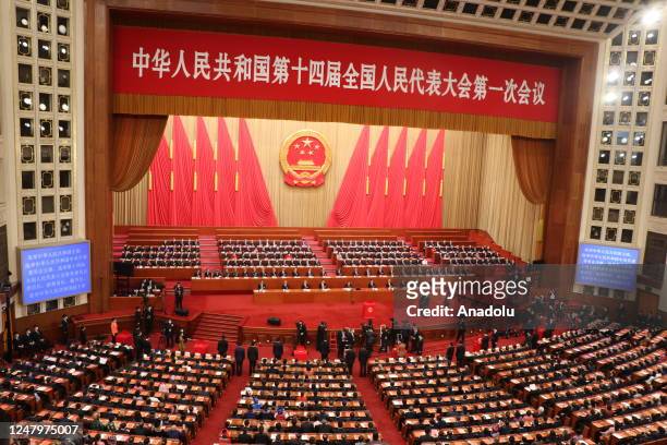 Chinese President Xi Jinping and Communist Party members attend the 1st General Assembly of the ongoing 14th term of the Chinese National People's...