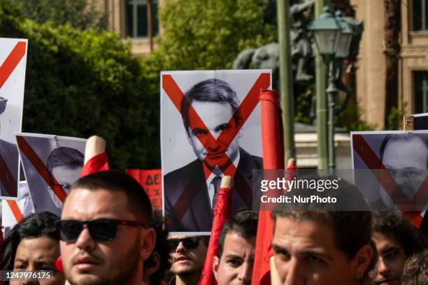 Banners with a photo of the PM of Greece Kyriakos Mitsotakis with an X red mark. Students protests on the street of Athens to demand justice for...