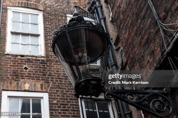 One of London's last remaining gas lamps is pictured near Covent Garden on 7 March 2023 in London, United Kingdom. Westminster City Council had...