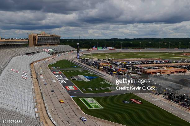 Cars race during the NASCAR Cup Series Folds of Honor QuikTrip 500 at Atlanta Motor Speedway on June 07, 2020 in Hampton, Georgia.