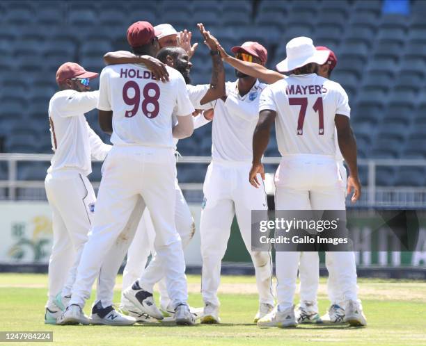 Reymon Reifer of the West Indies celebrates the dismissal of Ryan Rickelton of South Africa with his teammates during day 3 of the 2nd Betway Test...