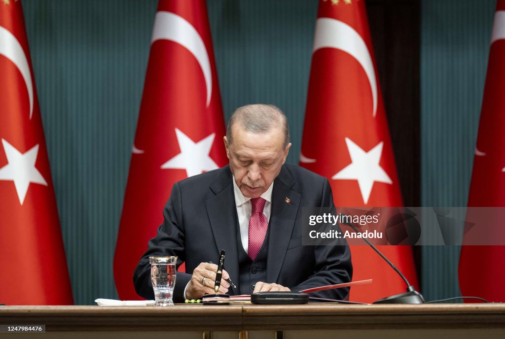 Tayyip Turkish President Recep Tayyip Erdogan signs the decision on Turkish ...