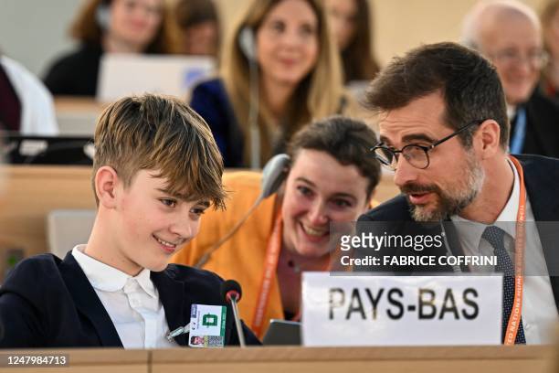 Twelve-year-old Dutch representative Nesta de Bie reacts after delivering a speech during a panel on Childrens Rights and the Digital Environment to...