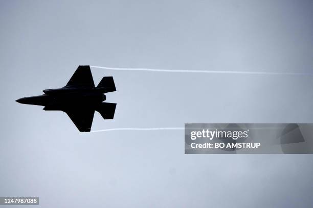 An US F-35 fighter jet is pictured during an event of the US Air Force visiting with five US F-35 fighter jets at the Danish Airbase Fighter Wing...