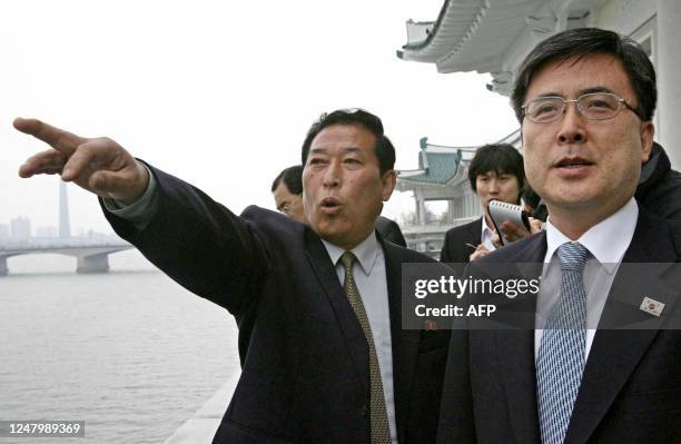 Chin Dong-Soo , who leads the South's government delegation to North Korea, looks on as his North Korean counterpart Ju Dong-Chan gestures after...