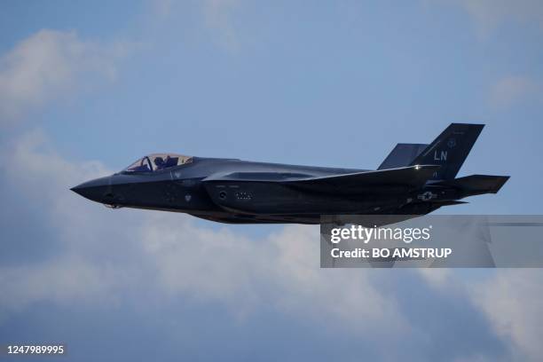 An US F-35 fighter jet is pictured during an event of the US Air Force visiting with five US F-35 fighter jets at the Danish Airbase Fighter Wing...