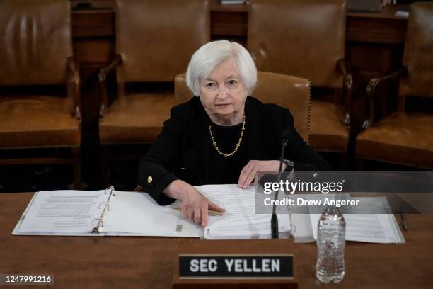 Treasury Secretary Janet Yellen takes her seat as she arrives for a House Ways and Means Committee hearing on Capitol Hill March 10, 2023 in...