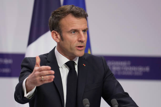 French President Emmanuel Macron talks during a joint news conference at the Elysee Palace on March 10, 2023 in Paris, France. French President...