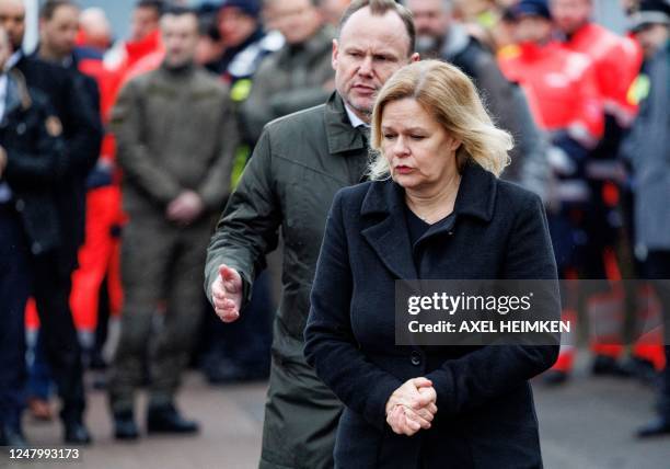 German Interior Minister Nancy Faeser and Hamburg's Interior Senator Andy Grote are seen at the tatort where several people were killed in a church...