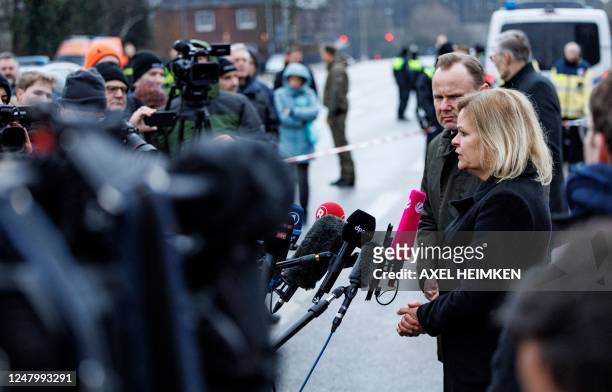 German Interior Minister Nancy Faeser speaks to the press during her visit with Hamburg's Interior Senator Andy Grote at the tatort where several...
