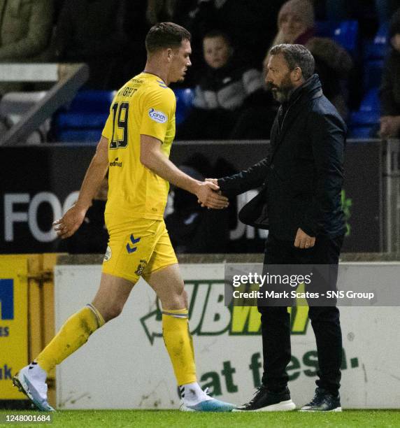 Kilmarnock manager Derek McInnes shakes hands with Joe Wright during a Scottish Cup Quarter-Final match between Inverness Caledonian Thistle and...