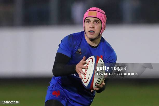 France's scrum-half Baptiste Jauneau looks to pass the ball during the Six Nations U20 rugby union match between England and France at the Recreation...