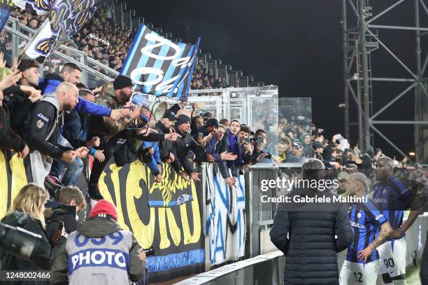 Fans of FC Internazionale and Federico Dimarco and Romelu Menama Lukaku Bolingoli of FC Internazionale during the Serie A match between Spezia Calcio...