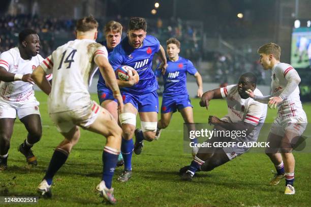 France's Mathis Castro Ferreira runs in a try during the Six Nations U20 rugby union match between England and France at the Recreation Ground in...